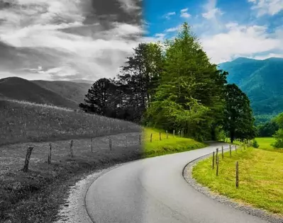 A photograph of a Smoky Mountain getaway with half of the picture in black and white.