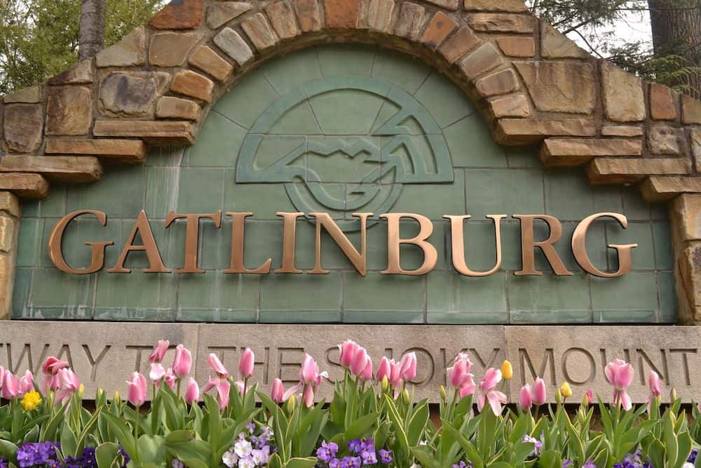 Gatlinburg in March sign with flowers