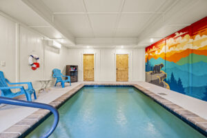 Pool room is behind a door with a coded lock, to keep the littles safe!